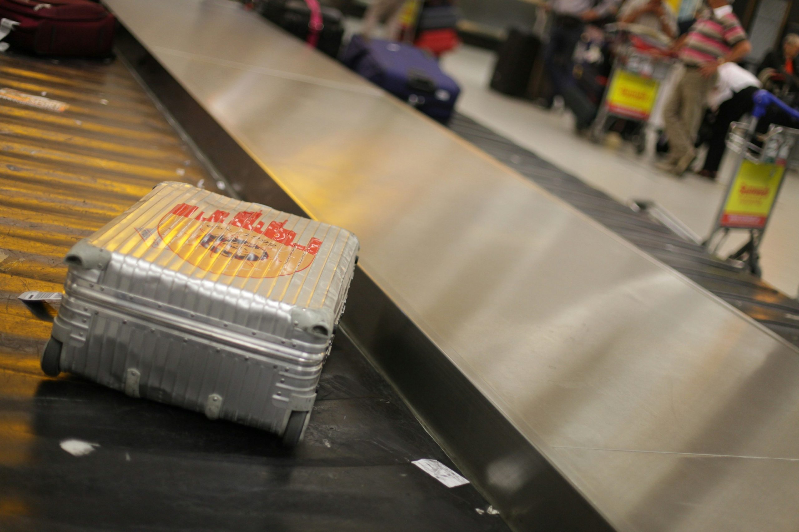 When a person with diabetes travels by plane, is it safest to put insulin and blood glucose meters in checked baggage?