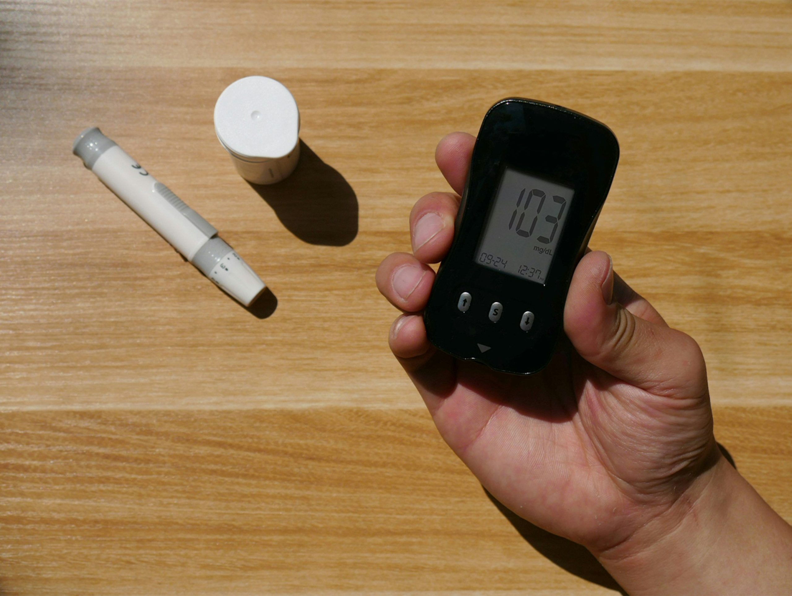 Should diabetic patients regularly check their blood sugar levels during long-distance driving?