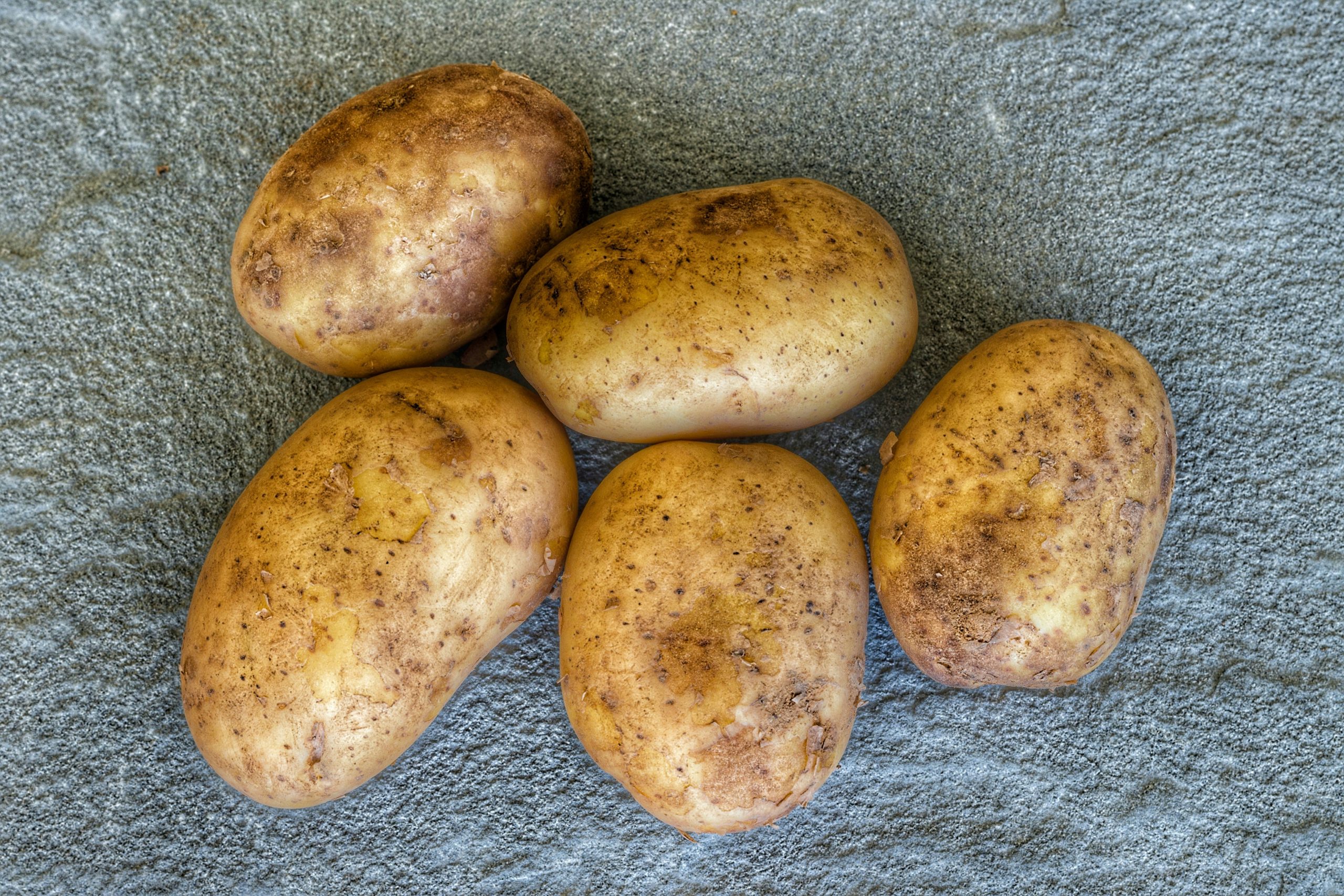 For blood sugar management, is it more beneficial to eat potatoes boiled or steamed and then cooled, rather than fried?